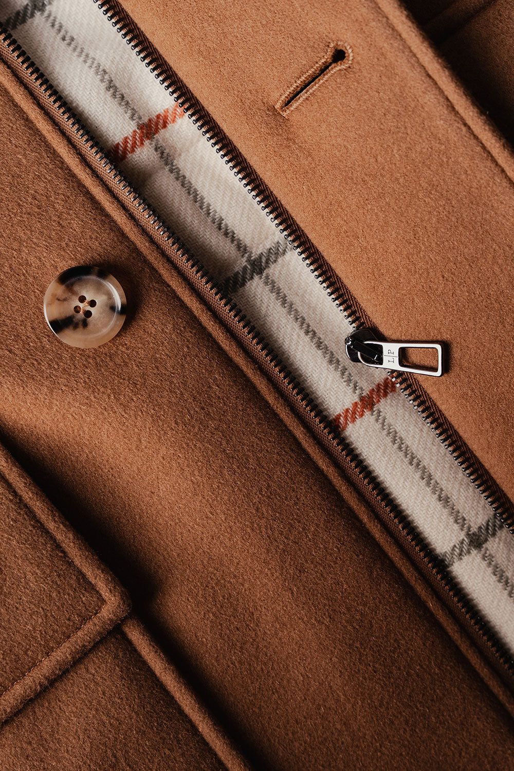 Camel coat with checked lining and horn button